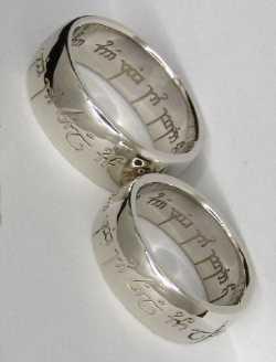 coffeeandklonopin:  livykat:  jumpropejellyfish:  lainalulu:  aryssarynn:  Wedding rings! The elvish engraving says: “One ring to show our love, one ring to bind us, one ring to seal our love and forever entwine us.” I’m geeking out so hard right