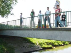 whpitout:  group pissing off a bridge 