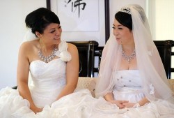 thedailywhat:  Same-Sex Buddhist Nuptials of the Day: Their union may not be legal, but Yu Ya-ting and Huang Mei-yu on Saturday becameTaiwan’s first lesbian couple to be married in a Buddhist ceremony. Huang said the couple hoped that a wedding blessed