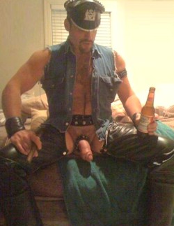 cansmoker84: smokepiguk:  andrewworcs: Fuckin hot fella!  Hot stud 🔥🔥  so many things are hot about this pic… his cigar, his beer, his pumped/siliconed cock, his gear, his denim vest, his messy bed… fuck bro, invite me over, we’re perfect