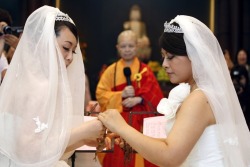 quirkytaiwan:  13 Photos From Taiwan’s First Same-Sex Buddhist Marriage Huang Mei-yu and Yu Ya-ting wed Saturday in a traditional Buddhist ceremony. Their union still isn’t recognized by the Taiwanese government, though support for gay marriage