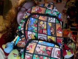 gamers-kitchen:  in other news check out my totally life-changing rucksack (the toy birds i bought separately) the bag was on £10! i don’t think it’s an official Angry Birds bag, because it didn’t have any Angry Birds tags on it whatsoever. I also