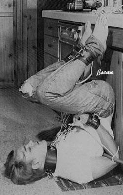bound-or-barefootbeuts:  barefootguysroped:  these old pics are great- is he trying to reach a knife with his feet?   I’ve always wondered where this one came from.  The guy IS cute though. 
