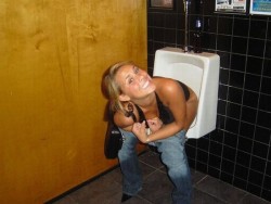 Girl in mens bathroom