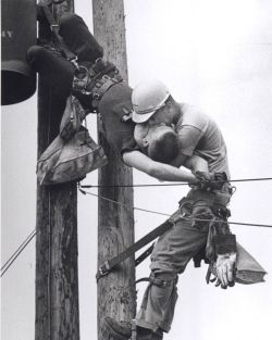 collective-history:  “Kiss of Life”, 1968 Pulitzer Prize A utility worker, J.D. Thompson, is suspended on a utility pole and giving mouth to mouth resuscitation to a fellow lineman, Randall G. Champion, who was unconscious and hanging upside down