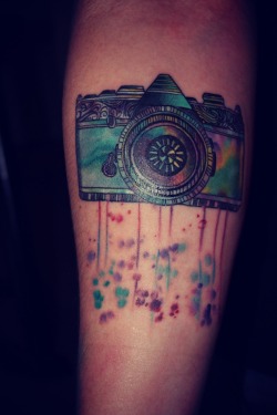 fuckyeahtattoos:  This is my camera tattoo on my right forearm. I actually found the design here on Tumblr. I am so in love with it. And the reason I got it is because I am a photographer. And I love what I do. I got it done at Article91 in Webster, Texas