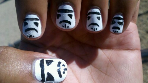 enchantedpsychopath:  My little sis did stormtroopers on my nails. Oh yeah!  It’s the effort that…counts?!…I guess.