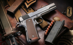 This is a Colt M1911A1 semi-automatic pistol,