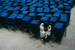  Two nurses take a break. FRANCE. Lourdes. 1989. Steve McCurry 