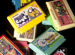 tinycartridge:  Adventure Time games for Famicom! Or fake labels based on the cartoon and slapped on Famicom cartridges, Famicase style. This is a thing people do all the time now! In fact, the site behind these mock-ups, SimplyAwful, is dedicated to