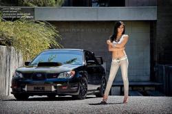 When it comes to import, the 4 cylinder turbo 305hp Subaru STI is untouchable, as untouchable as this girl is.