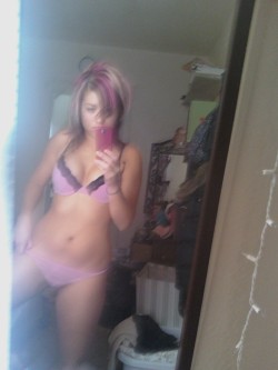 myemogirlfriend:  Cute teen selfshot in her mirror with a nice pink sexy kit 