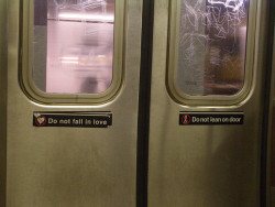 zubat:“Do not fall in love” sticker on the subway, NYC by David Boyle.