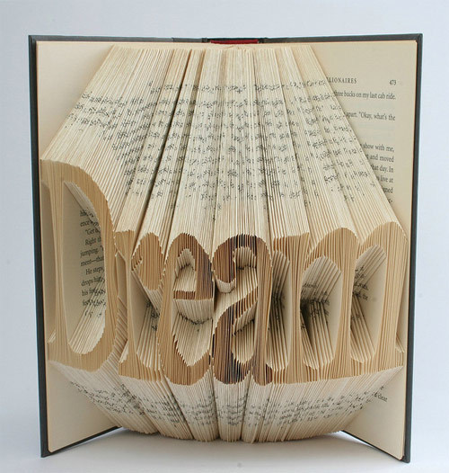 showslow:  Artist Isaac Salazar takes outdated text books and cast-off hardcovers