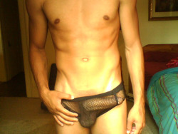 randy9bis:  Smooth boi, and sexy fishnet briefs in which to show off his hard-on !  :-) 