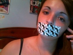 gagged4life:  pantyboss:  I’m bored as fuck.  I find it hard to believe that this mustache duct tape wasn’t made specifically for the silliness in seeing it used as a gag. Also, yay for tape gag selfies. 