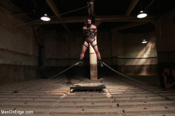 beggingtocum:  Hairy French stud Wilfried Knight has experience as a top but he knows that to really dish it out you need to experience it from the other side. He’s here today to learn such a lesson. In leather, he’s tied up to a pillar and blindfolded.