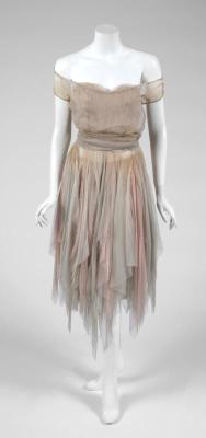 beyondthegoblincity:  Julien’s Auctions:  A pastel chiffon rag dress worn by Leslie Caron in the Cinderella tale The  Glass  Slipper  (MGM, 1955). The costume has a fitted boned bodice and an intentionally tattered skirt formed from layers of torn chiffon