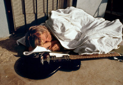 es-tro:      Kurt Cobain asleep after the underwater shoot of Nirvana for Nevermind. Kurt didn’t feel well that day.   