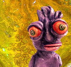 misscannabliss:  Muki Dook monster doll alien purple clay by Alyshells Silvicultor on Flickr.  