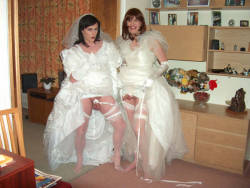 stockinglover6:  meninlipstick:  How often do you see two crossdressers in bridal dresses? Showing their dicks? It’s like Haley’s Comet or something.  stockinglover6 I want to join in with them on the honeymoon nights 