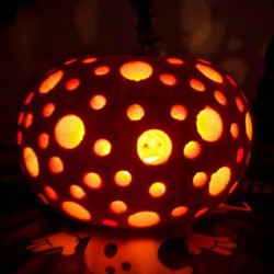 My pumpkin I carved :3 #pumpkin #halloween #holes #circle #candles #lantern