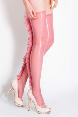 thembonez:  Mermaid tail, reptile stockings. In pale pink latex. 