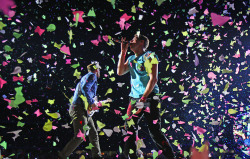 Chris Martin and Jonny Buckland of Coldplay perform before a sold-out crowd in Melbourne, Australia
