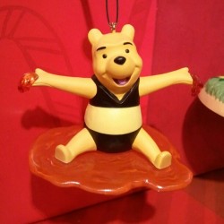 nostrokesjuststrudels:  kelbebop:  I think Pooh is supposed to be dressed as a bee, but it looks like he’s sporting a stylish black two-piece. Kudos, Hallmark.  fierce 