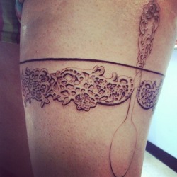 fuckyeahtattoos:  My lace garter, in progress. I am a chef and wanted to incorporate a silver spoon tucked into it. By Korey Pirtle of X Body Swansea, MA, USA 