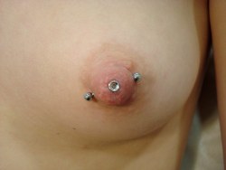 piercednipplegirls:  nipple microdermals!  I think they are HOT! 