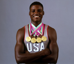 siphotos:  Carl Lewis poses with the four gold medals he won at the 1984 Summer Olympics in Los Angeles. (Neil Leifer/SI) SI VAULT: Lewis epitomizes victory with four gold medals (8.20.84) 