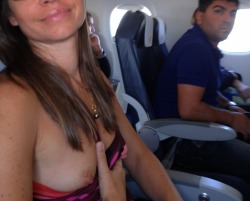 thesexualgourmet:  Airplane flash…with a suspicious onlooker 