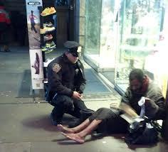 NYPD officer buys homeless man a pair of boots - an angel at