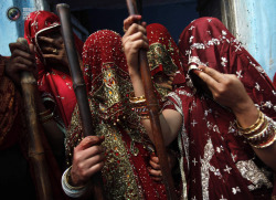 allasianflavours:  Veiled Hindu women hold